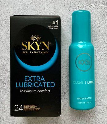 Набор SKYN Extra Lube 24 шт. - Лубрикант EXS Clear Lube 100 мл. SOS2584 фото